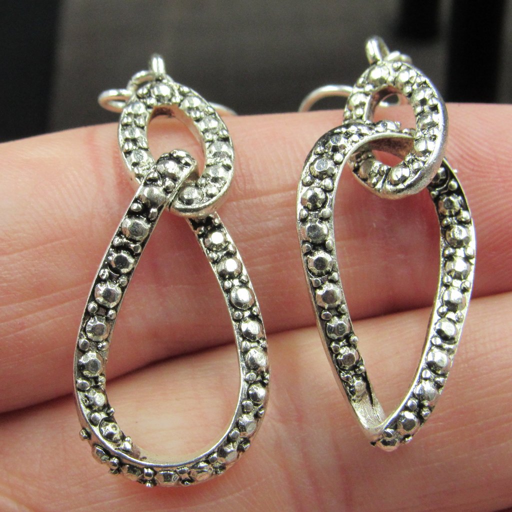 Silver Tone Interlocking Pattern Dangle Earrings